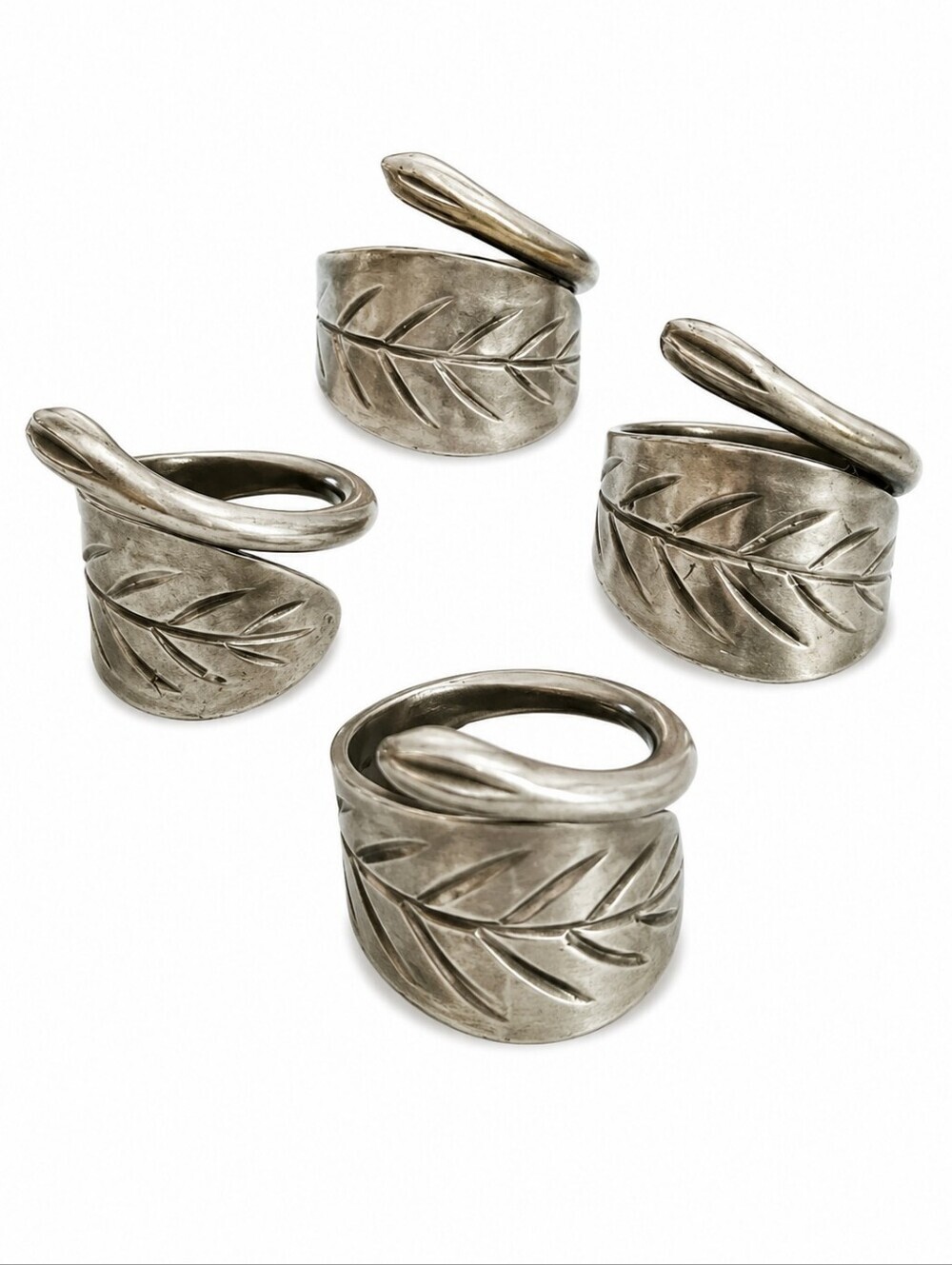 Set of Four Pewter Leaf Napkin Ring Holders